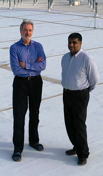 Ward Jewell and engineering Professor Visvakumar Aravinthan on the roof of the John Bardo Center.