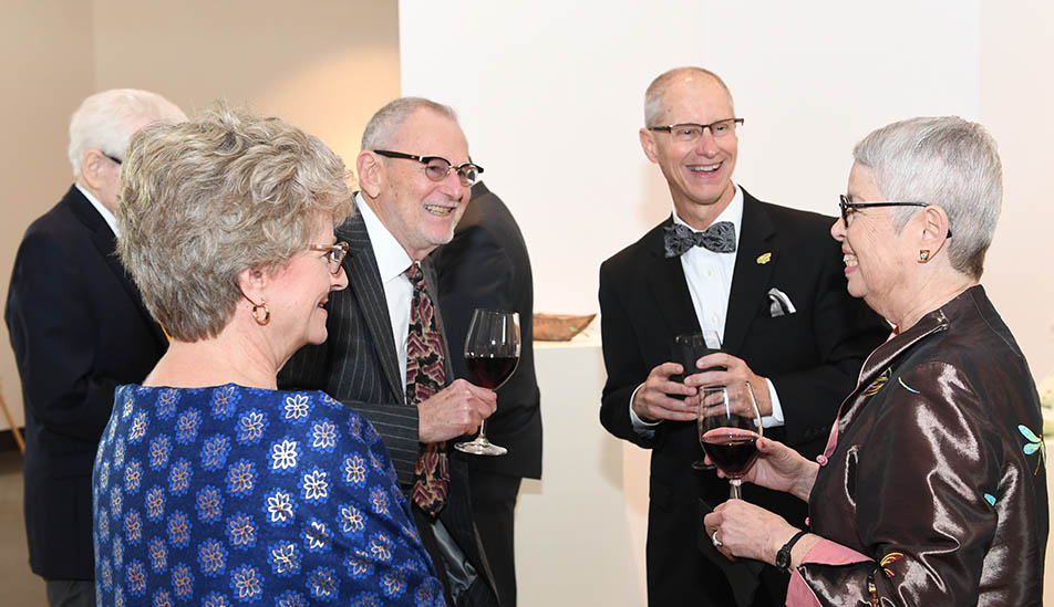 Mike & Susan Lamb visit with Martin and Donna Perline at Wichita State University's President's Club member celebration