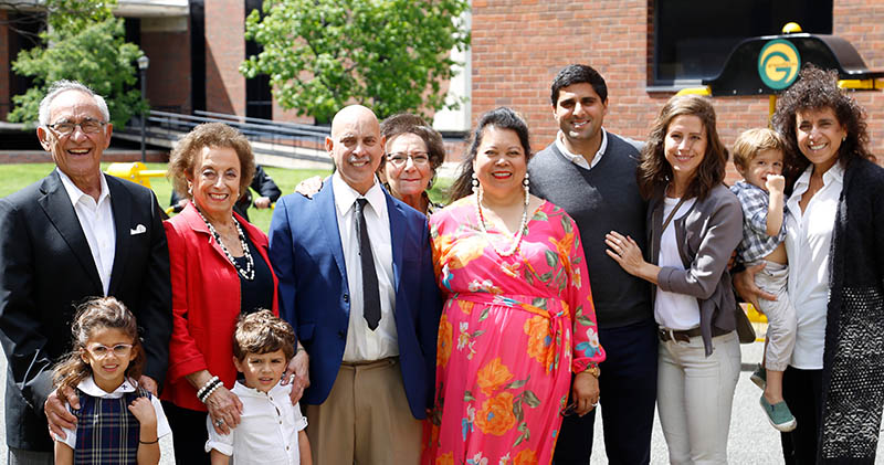 Members of the Kouri family, including Sam and Jacque Kouri, left. Sammy Kouri Jr., to whom the facility is dedicated, is to his mother’s left.