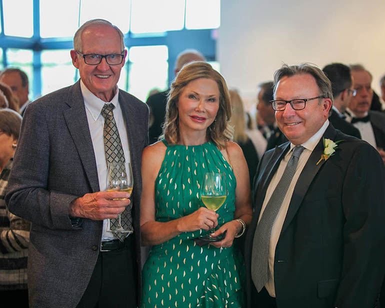 John Kready and Betty Troutman, new Lifetime members of the Fairmount Society, visited with Larry Beamer before the event.