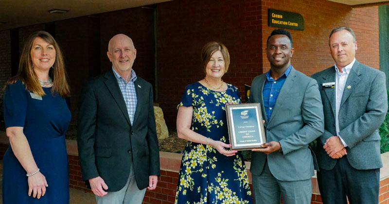 Credit Union of America representatives Lea Ann Gabbert, Kym Money and Bradley Dyer accepted the College Champion award from WSU’s College of Applied Studies Interim Dean Clay Stoldt and WSU Foundation Development Director Aaron Winter.
