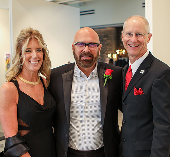 Karen and Kenton Richards celebrate becoming Life Members Pictured with Mike Lamb, WSU Foundation Vice President of Development Programs
