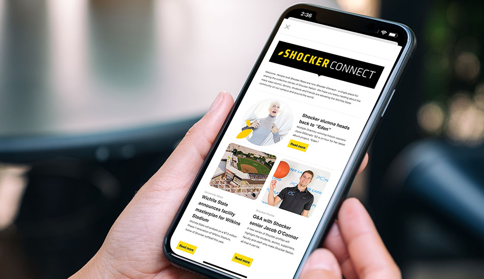 A smartphone displays the Shocker Connect blog