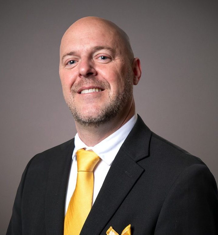 Headshot of Telly McGaha, President & CEO of wichita state foundation and alumni association