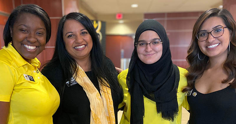 WSU Financial Aid Director Sheelu Surender, second from left, poses with WSU students at the annual Distinguished Scholarship Invitational.