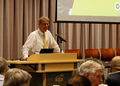 Dan Peare, board chair for the WSU Foundation, opens the National Advisory Council spring business meeting.